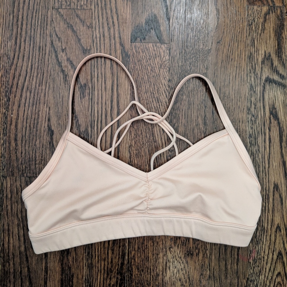 Alo Yoga peach bra.